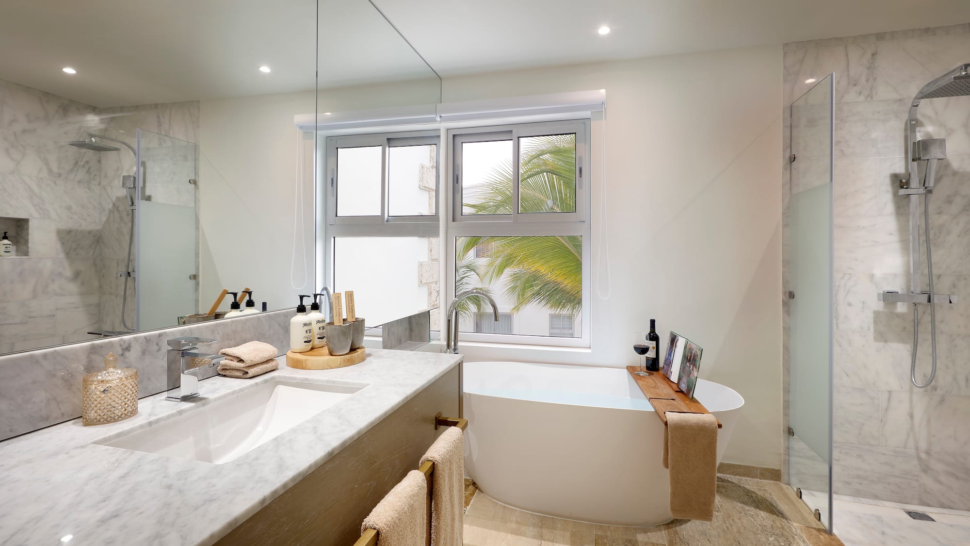 a bathroom with a large window and a tub
