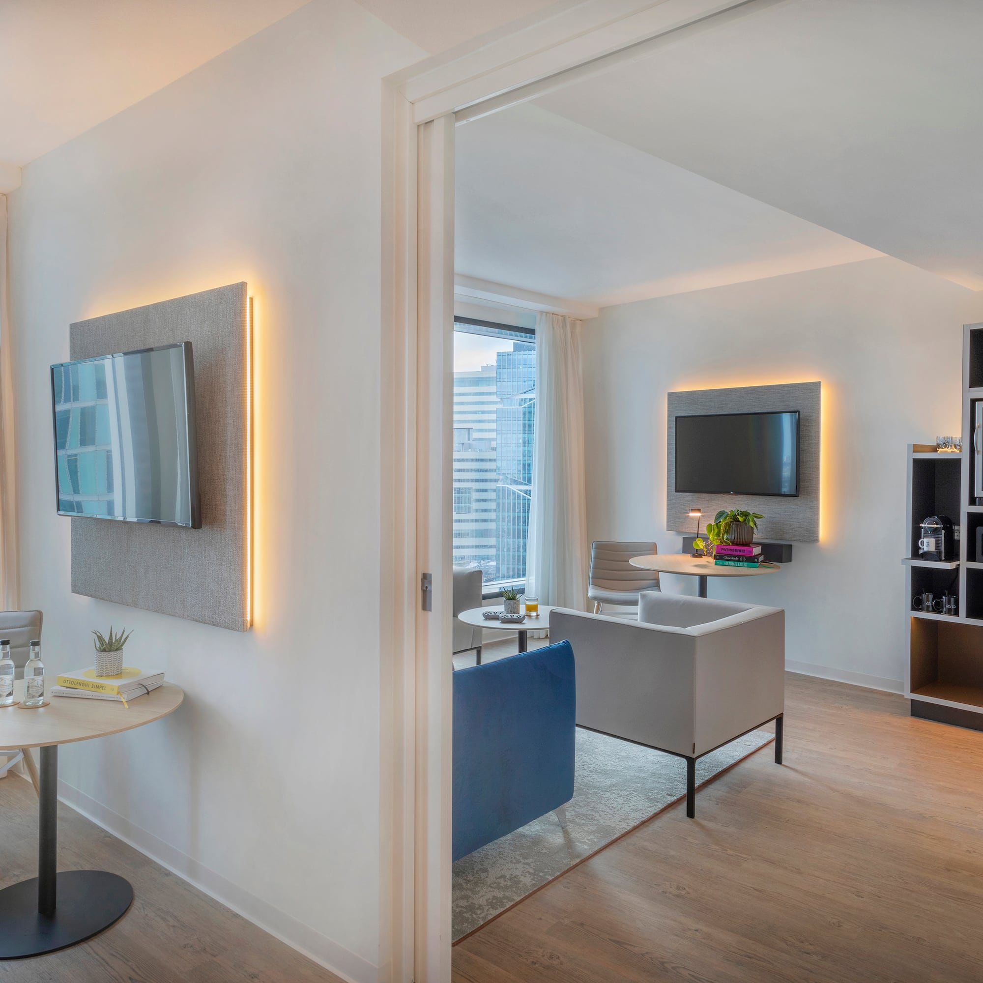 a room with a tv and a table