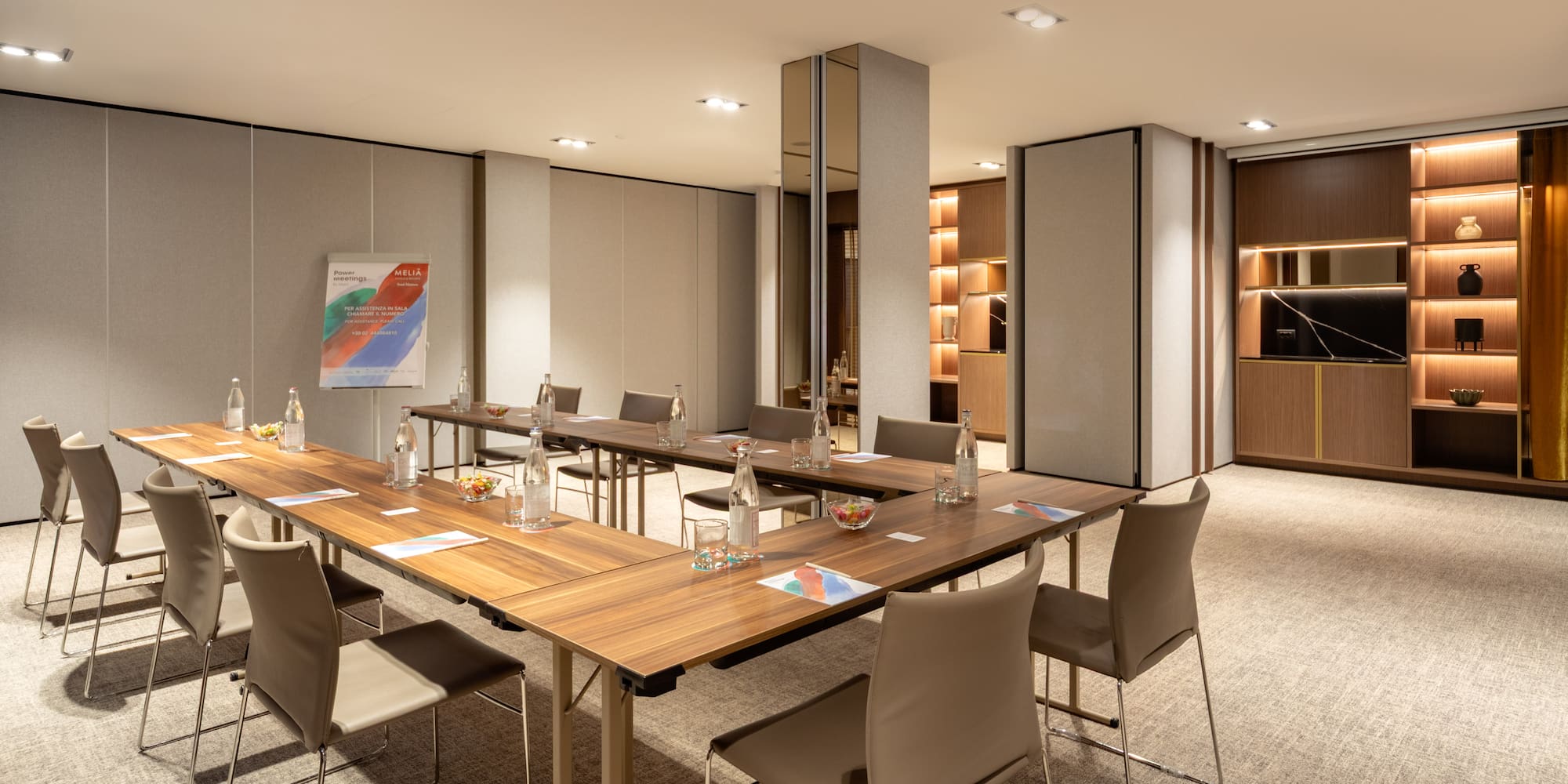 a room with a table and chairs