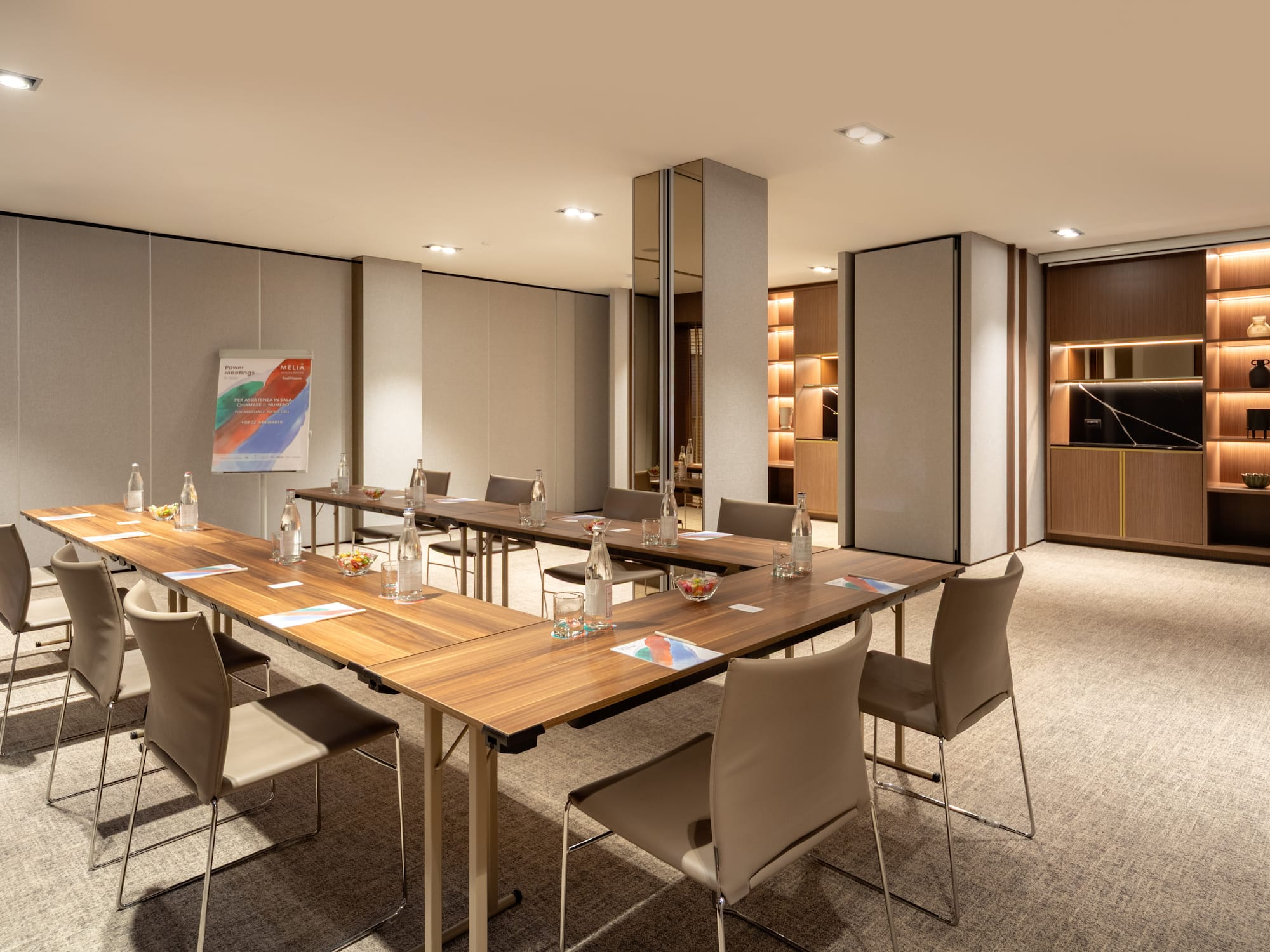 a room with a table and chairs