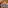 Tuscan living/dining room with brick vaulted ceiling and terracotta floor.