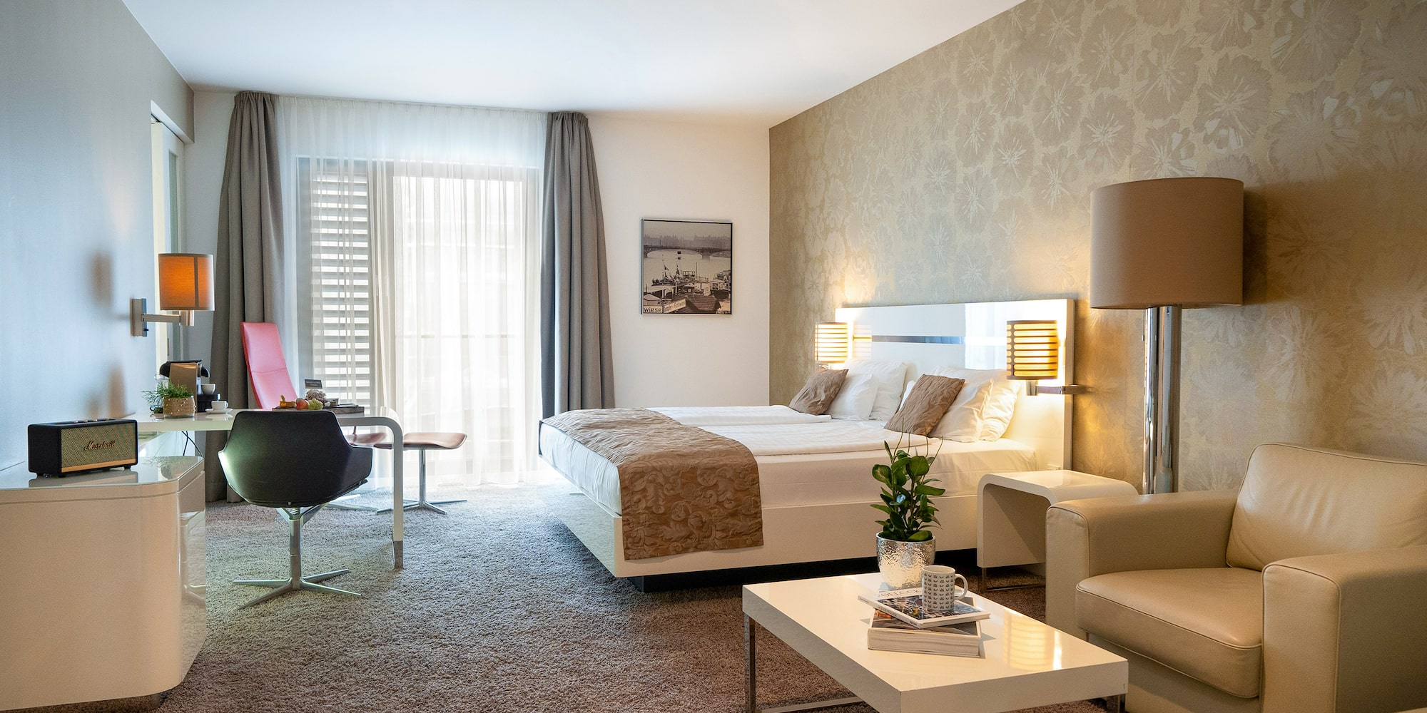 a room with a bed and a chair