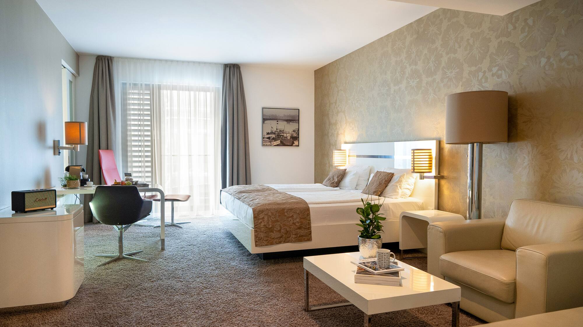 a room with a bed and a chair