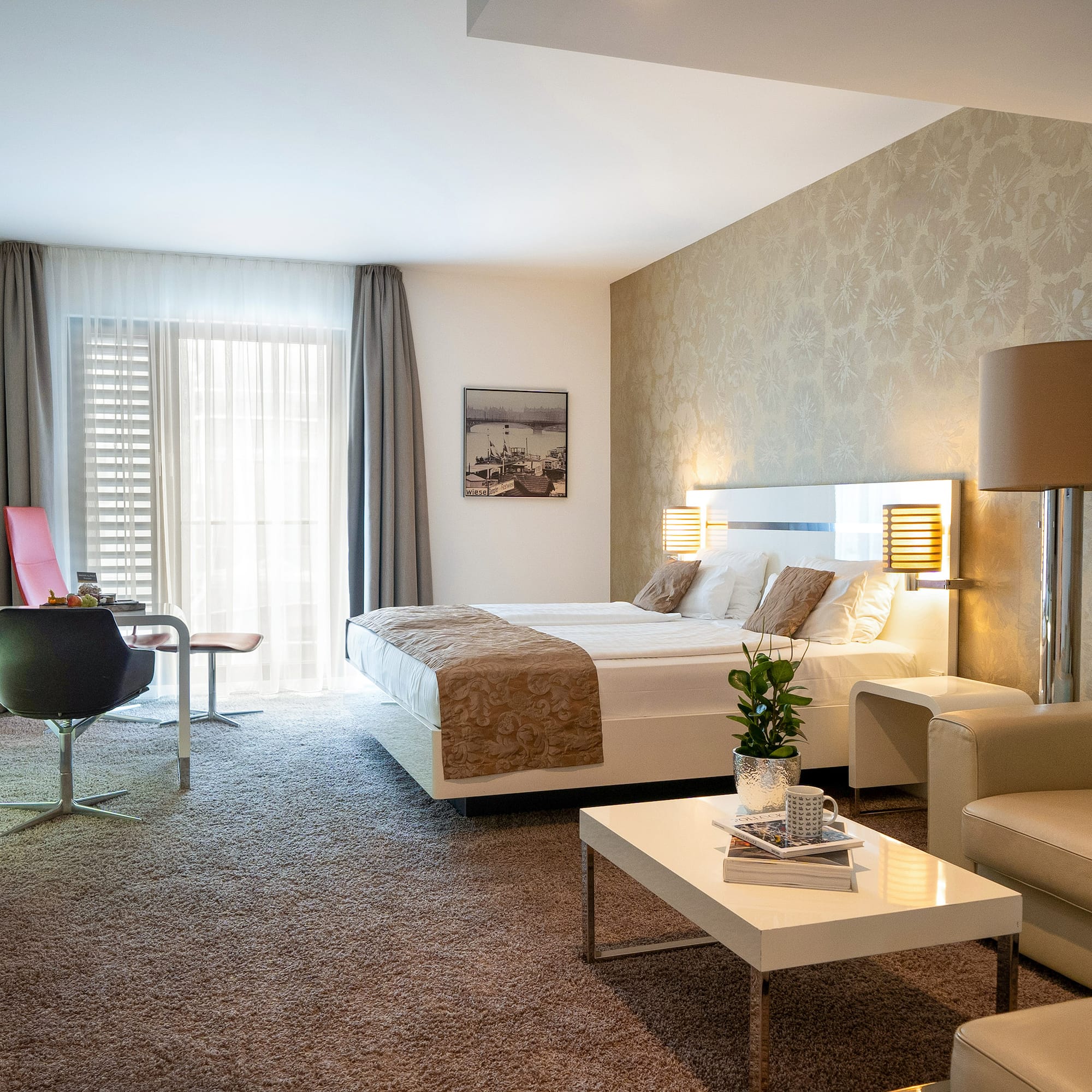 a room with a bed and a chair