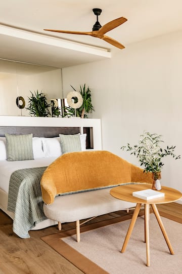 a room with a bed and a table