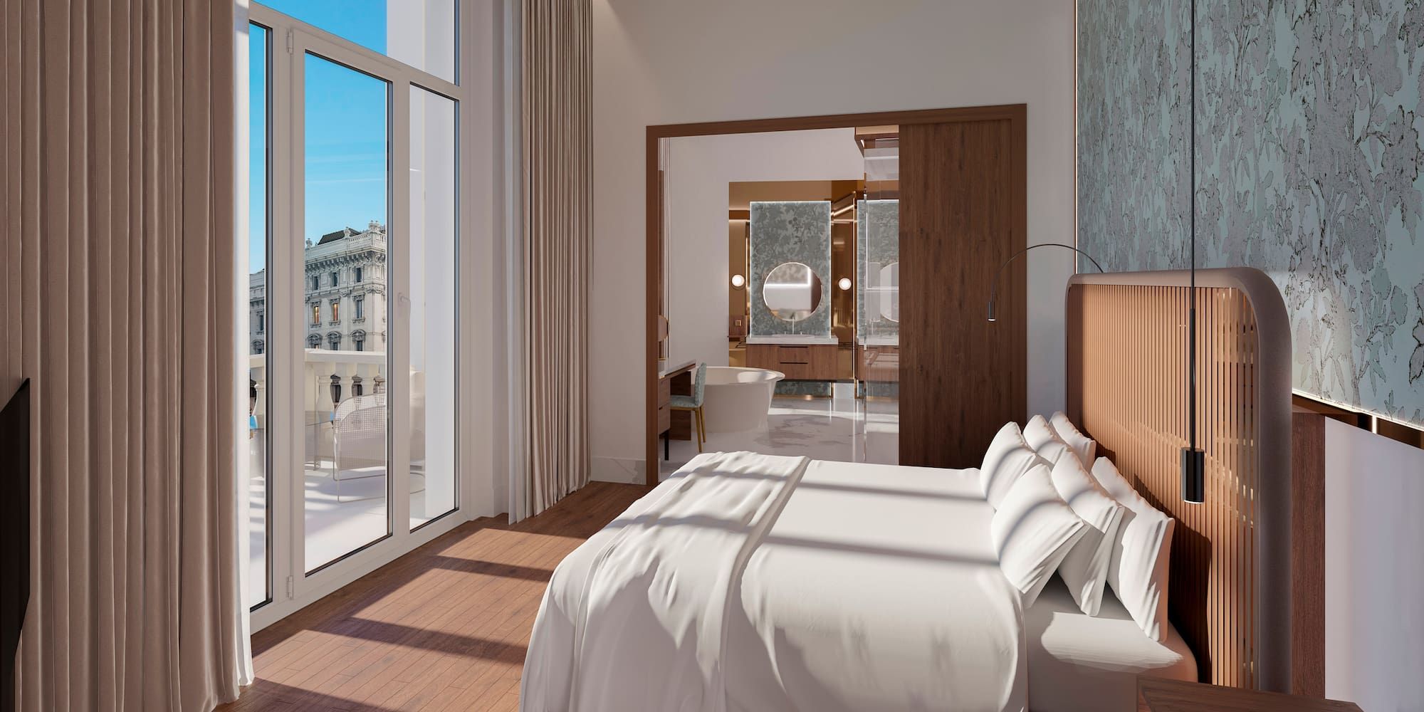 a bedroom with a bed and a wood floor