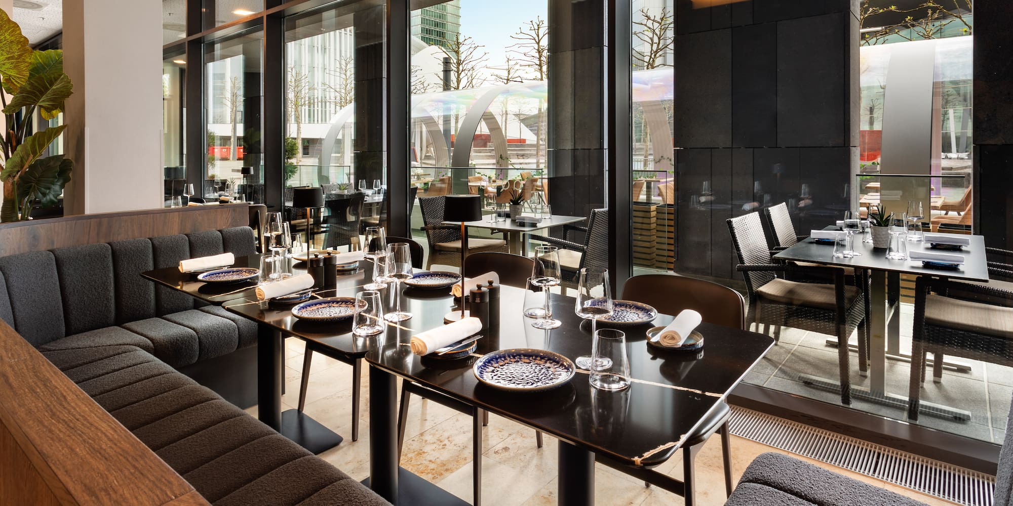 a restaurant with tables and chairs