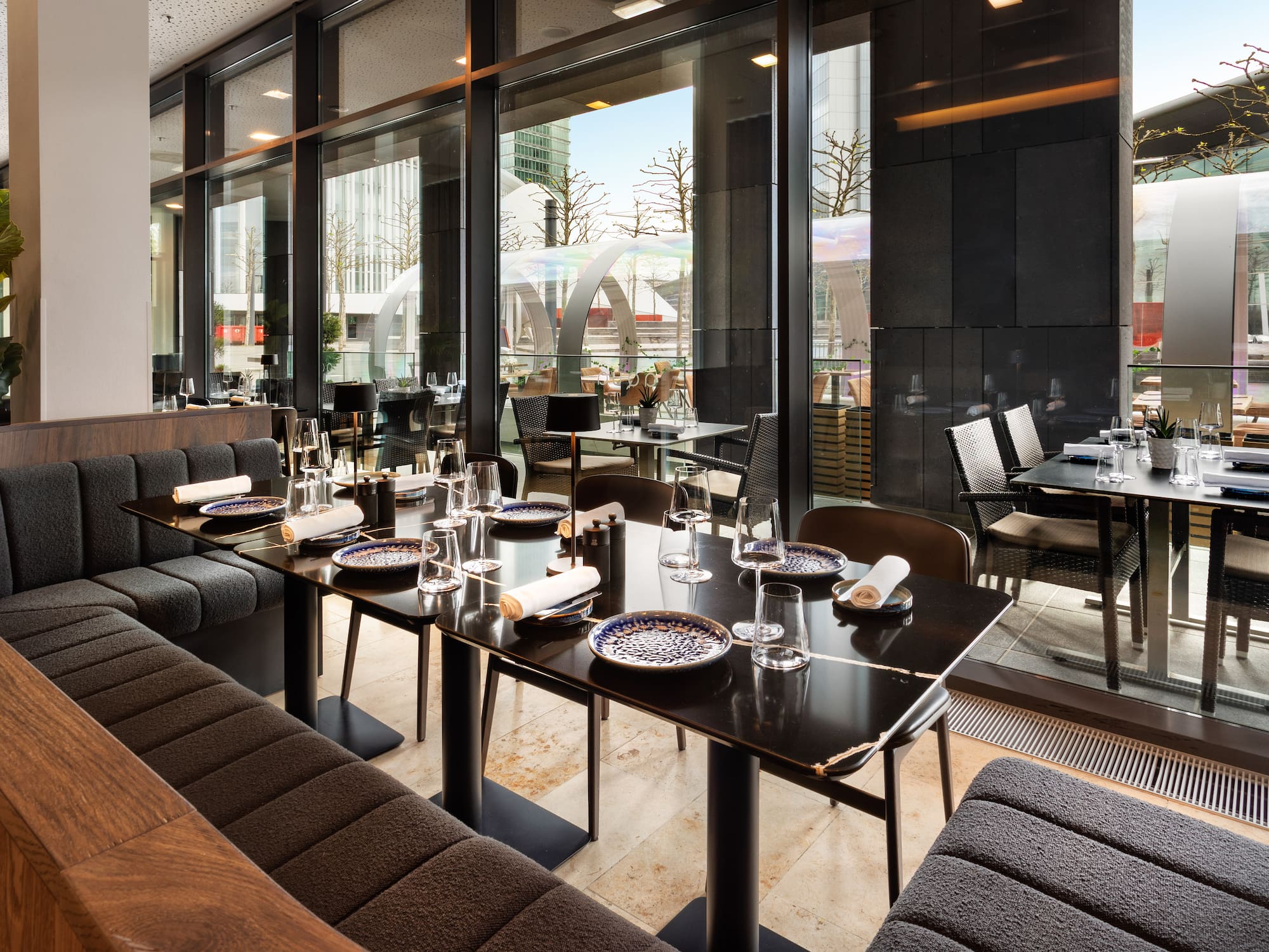 a restaurant with tables and chairs