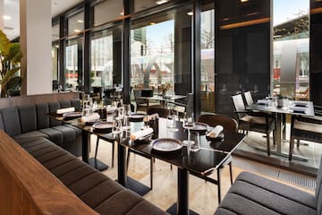 a restaurant with tables and chairs