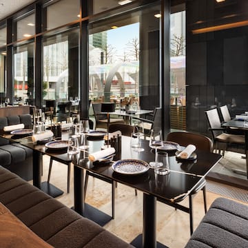 a restaurant with tables and chairs
