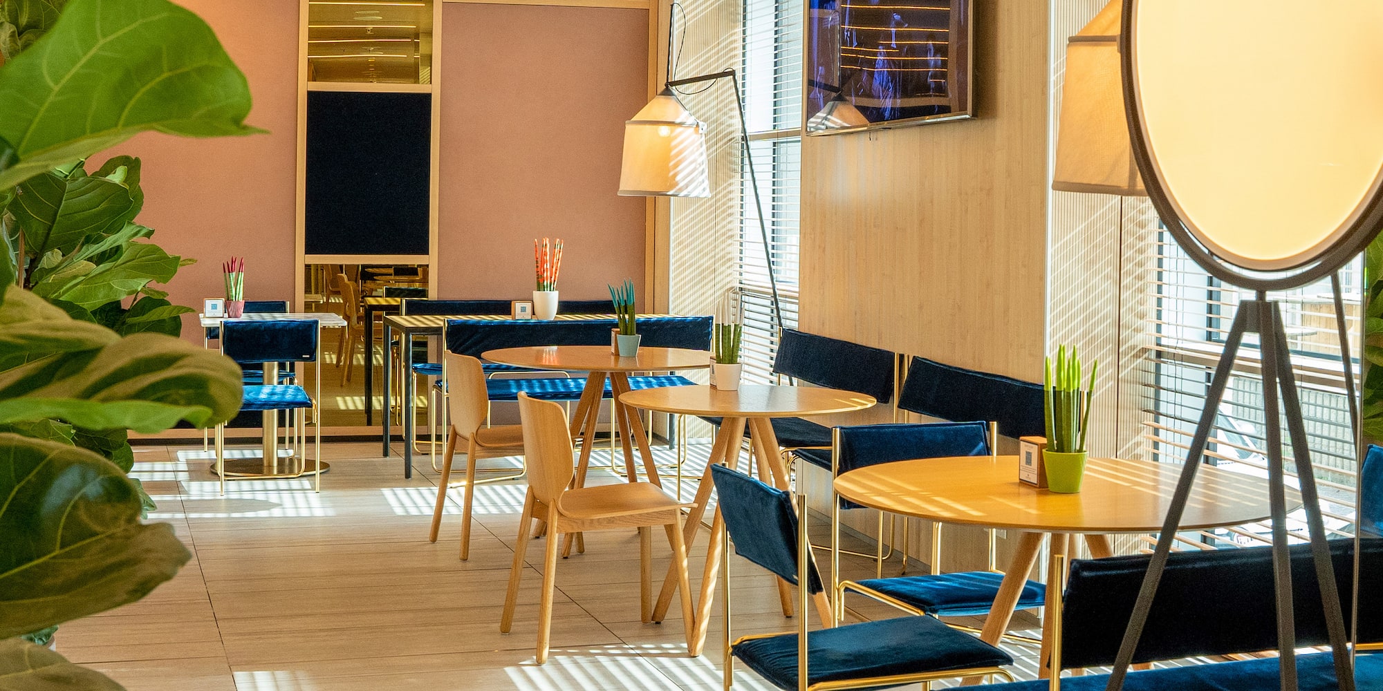 a room with tables and chairs