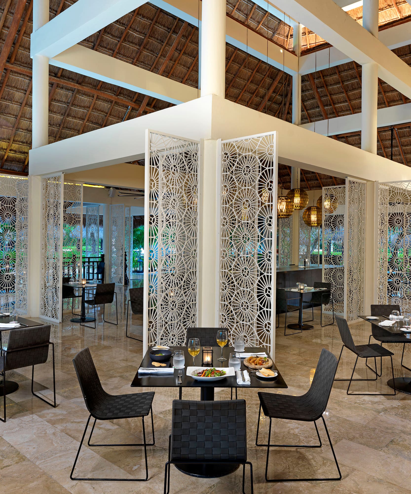 a restaurant with tables and chairs