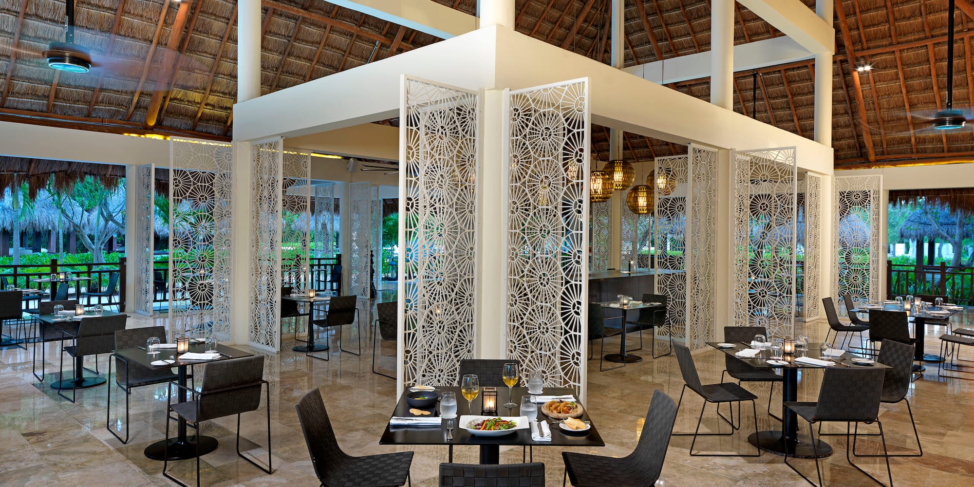 a restaurant with tables and chairs