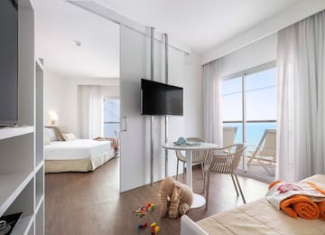 a room with a television and a bed