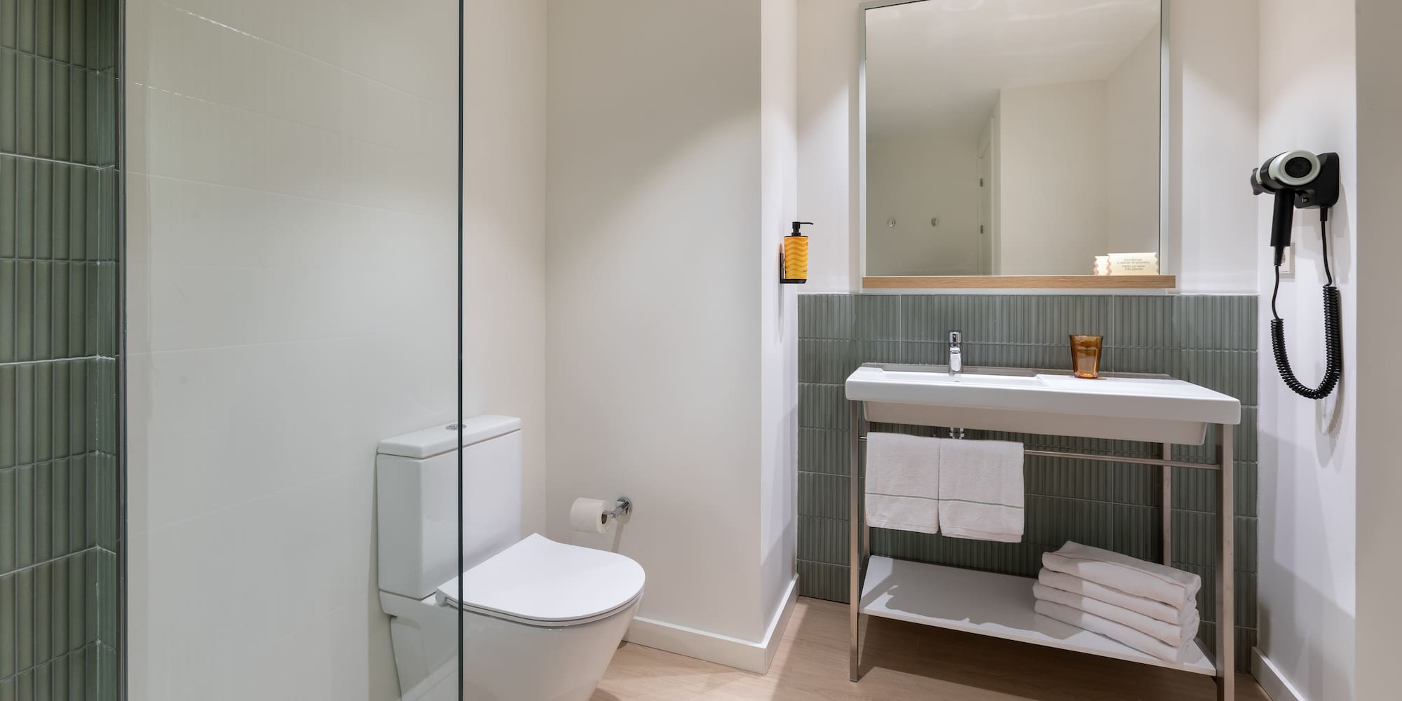 a bathroom with a sink and toilet