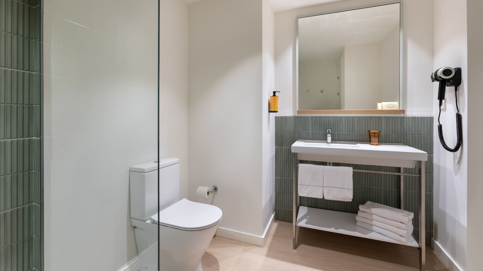 a bathroom with a sink and toilet