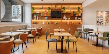 a room with tables and chairs