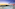 Sunset over rooftop infinity pool, ocean view, lounge, cocktail, red heart.