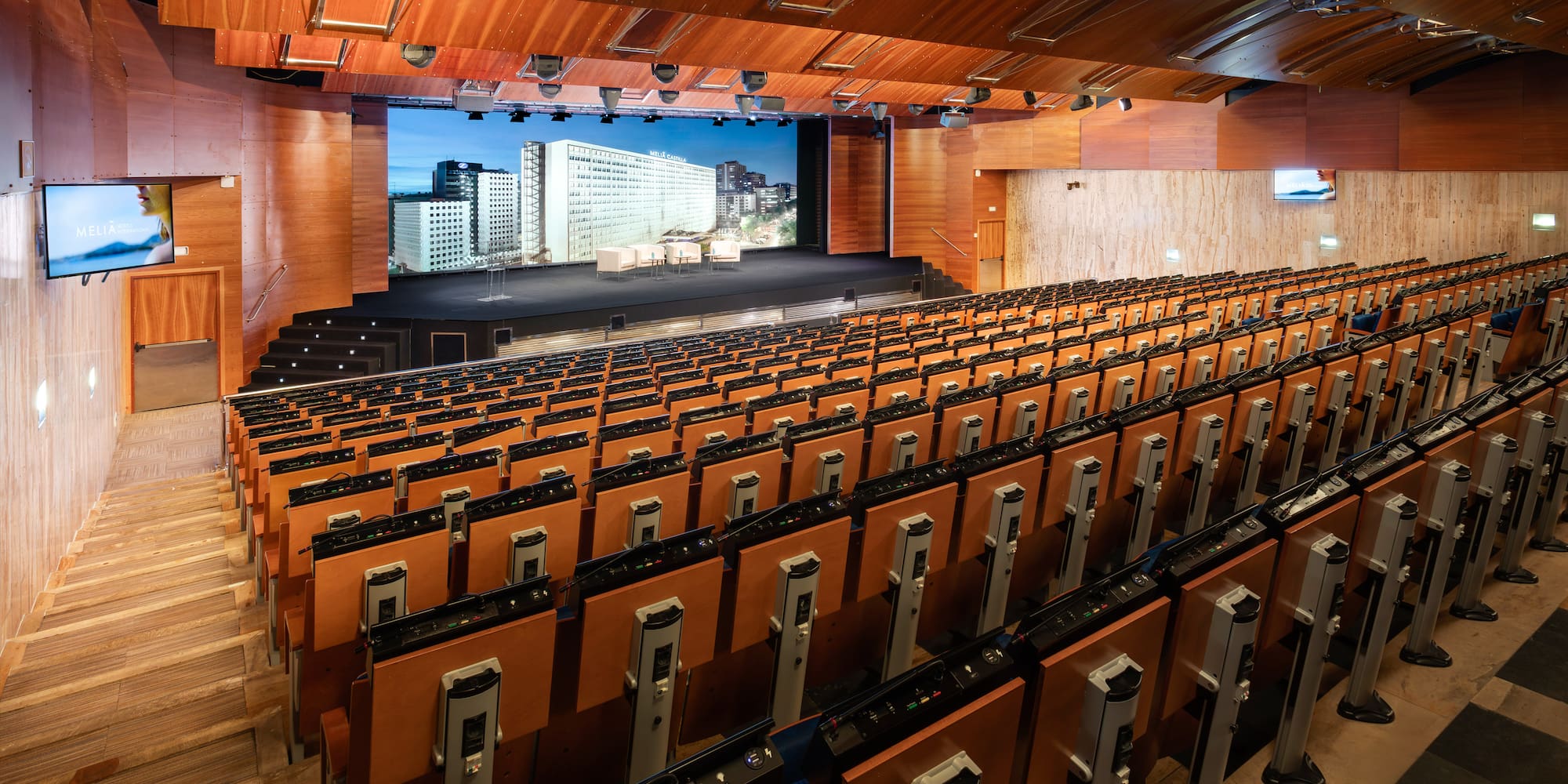 a large auditorium with rows of seats