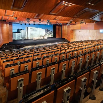 a large auditorium with rows of seats