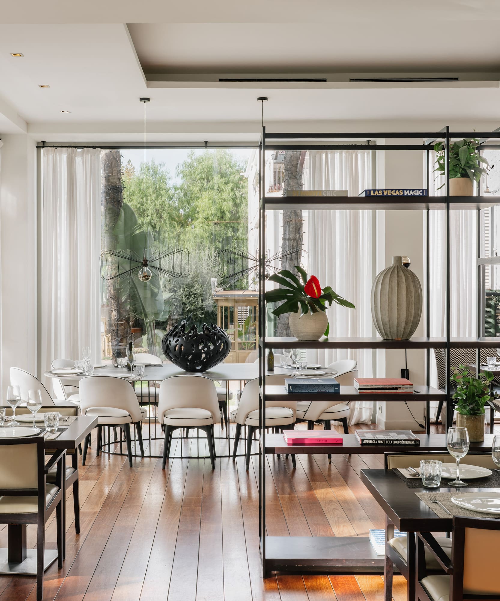 a room with a table and chairs