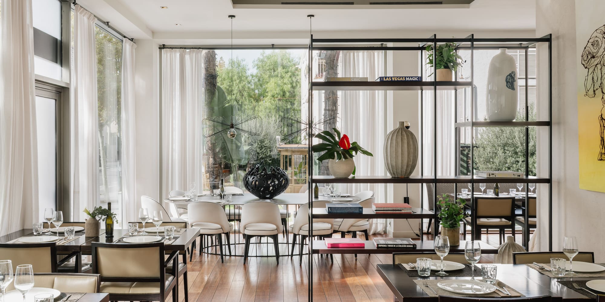 a room with a table and chairs