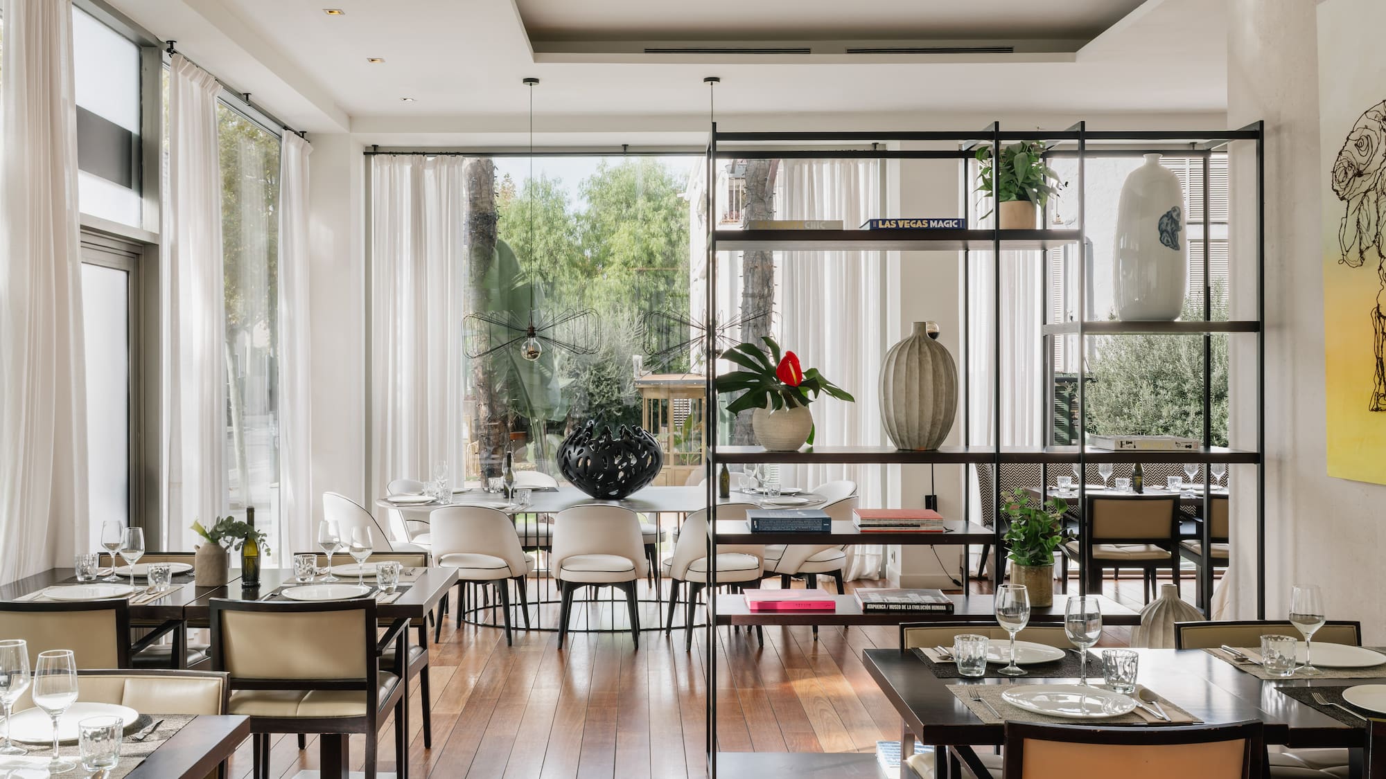 a room with a table and chairs