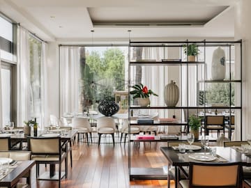 a room with a table and chairs