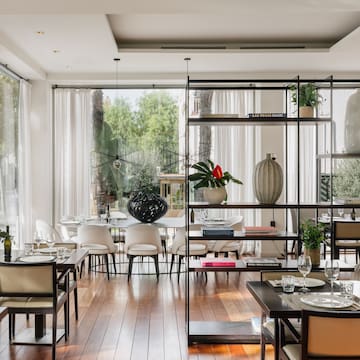 a room with a table and chairs