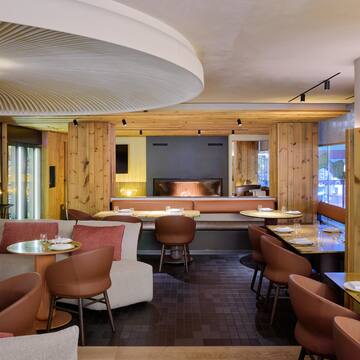 a room with tables and chairs