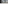 White bed by window, snowy mountain village view, dark curtain.