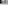 White bed by window, snowy mountain village view, dark curtain.