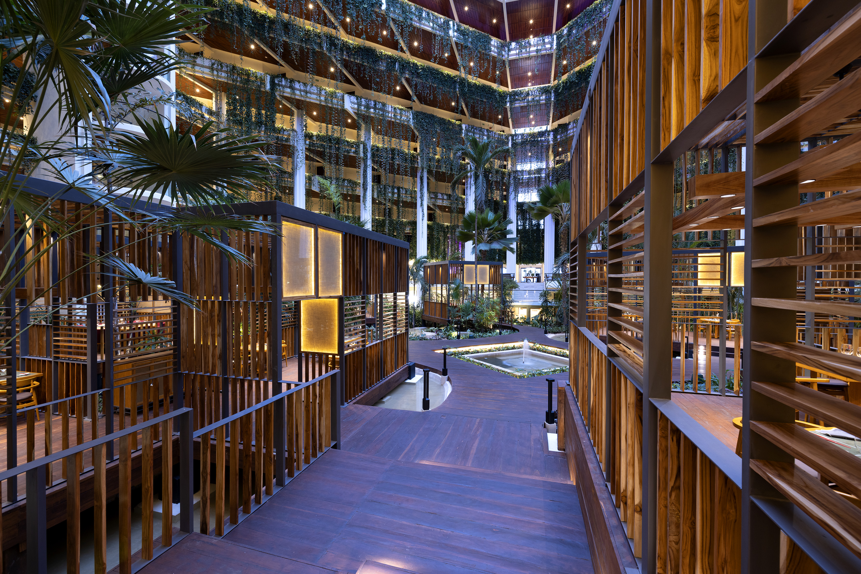 a wood walkway in a building