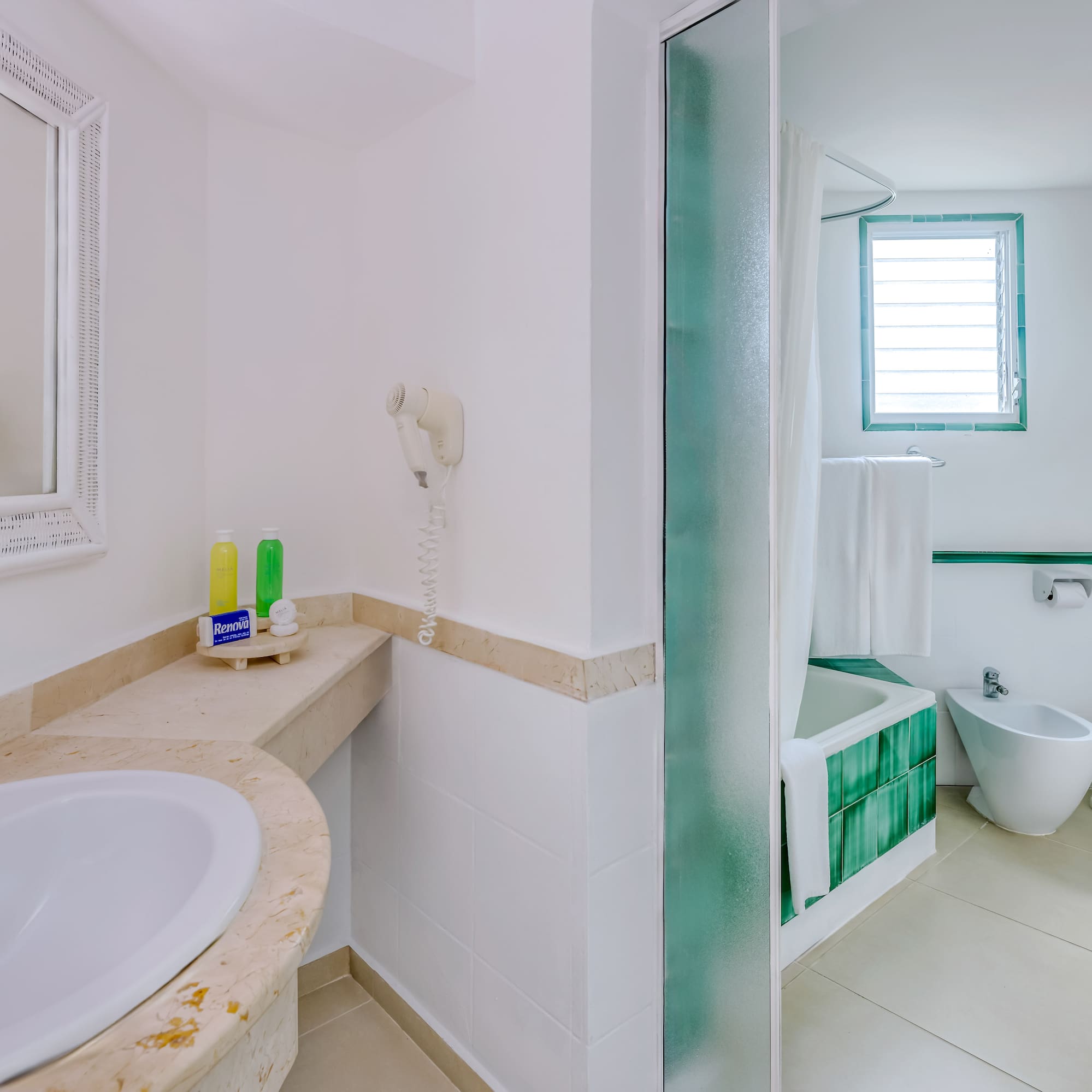 a bathroom with a sink and a bathtub