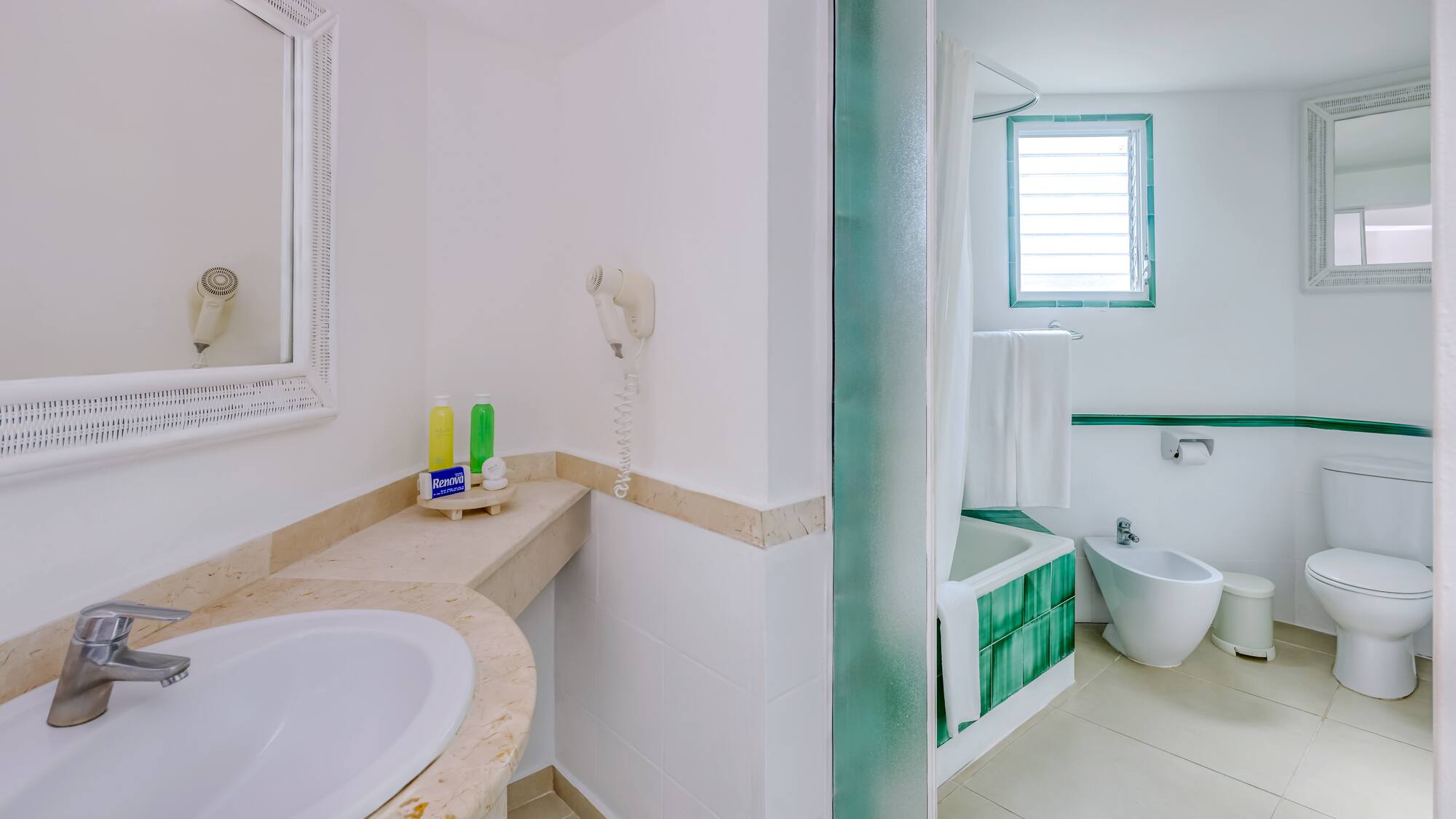 a bathroom with a sink and a bathtub