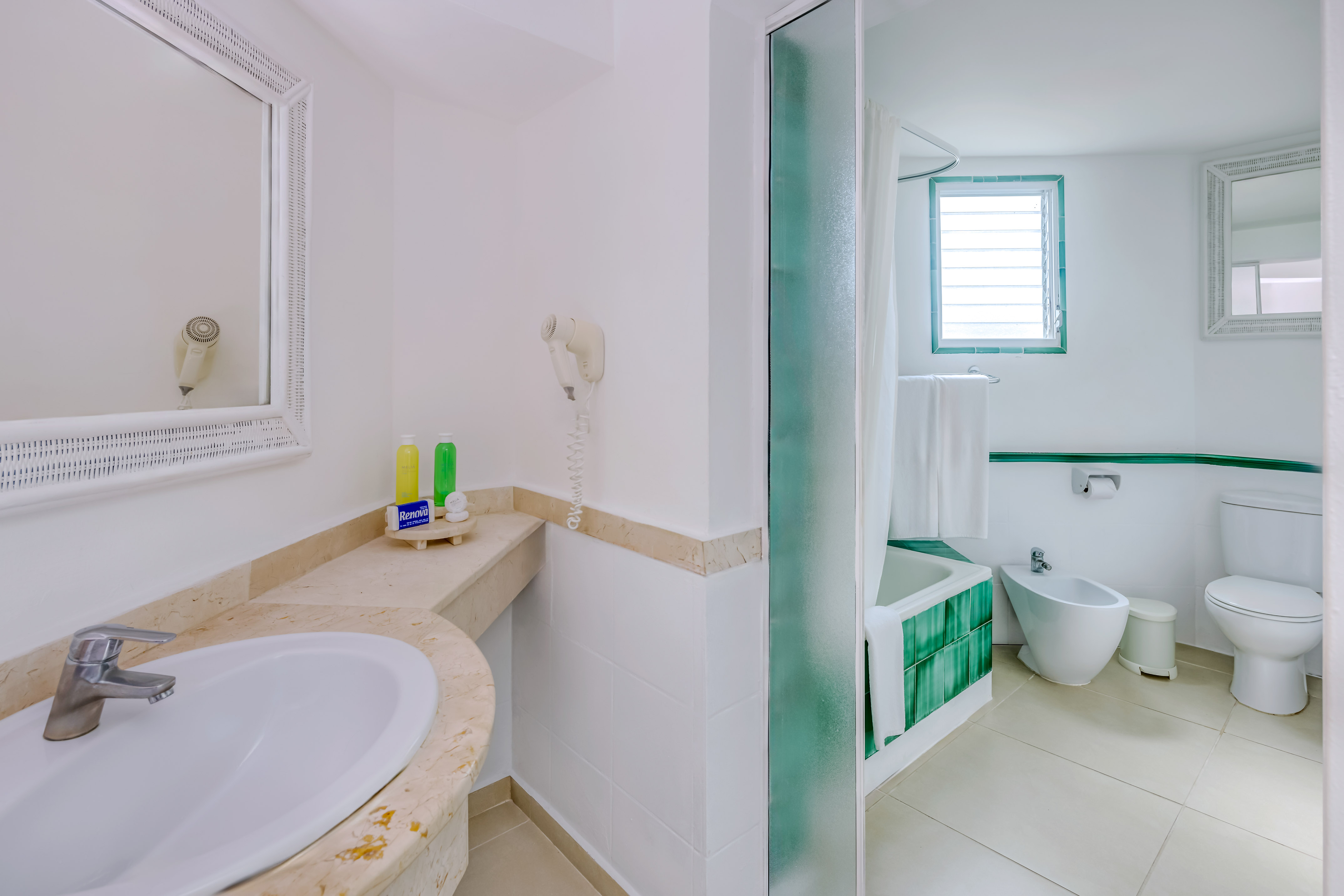 a bathroom with a sink and a bathtub