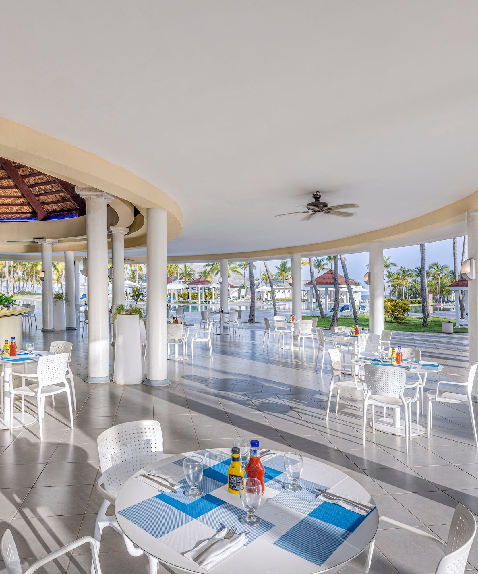 a large room with tables and chairs