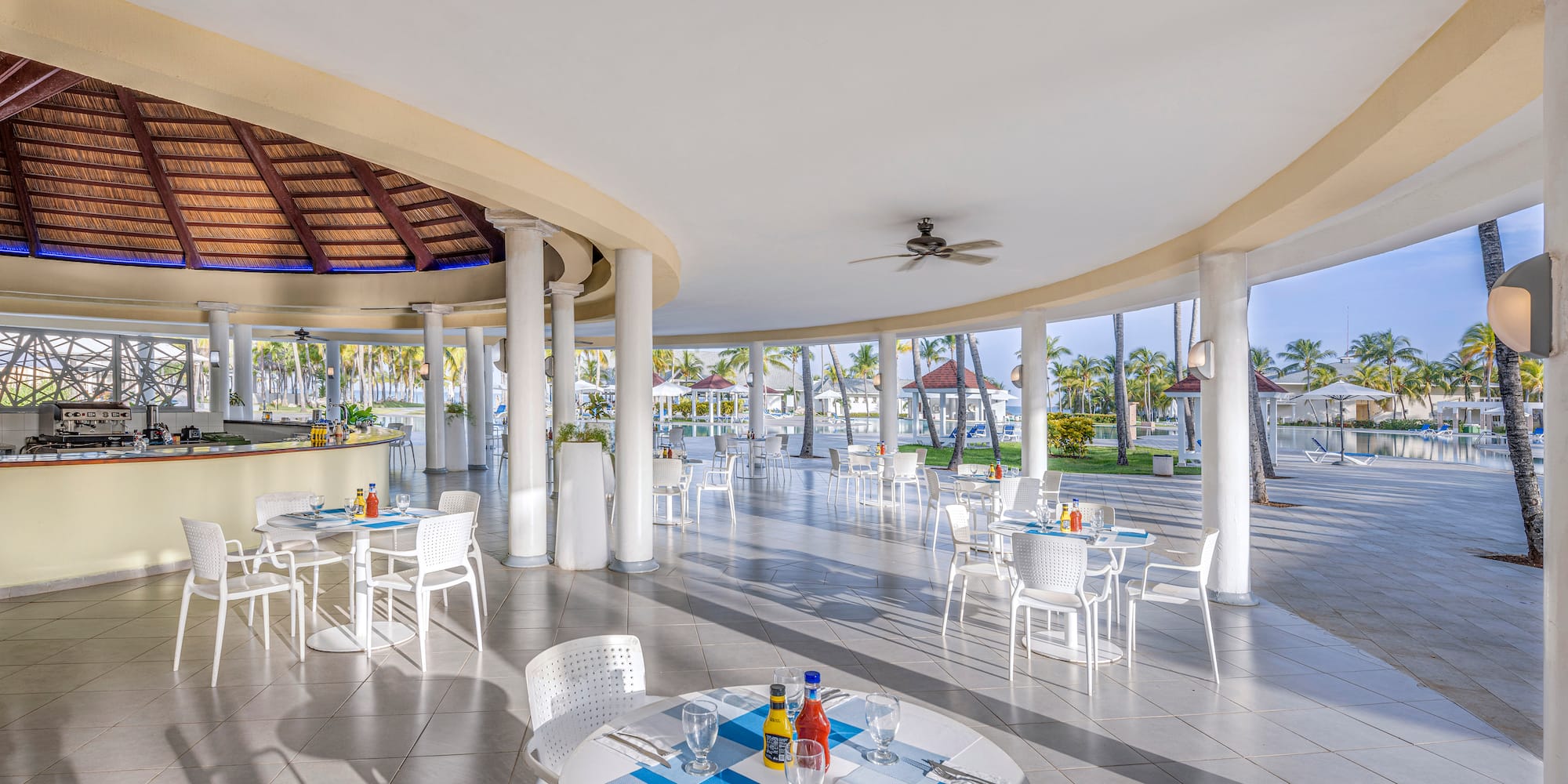 a large room with tables and chairs