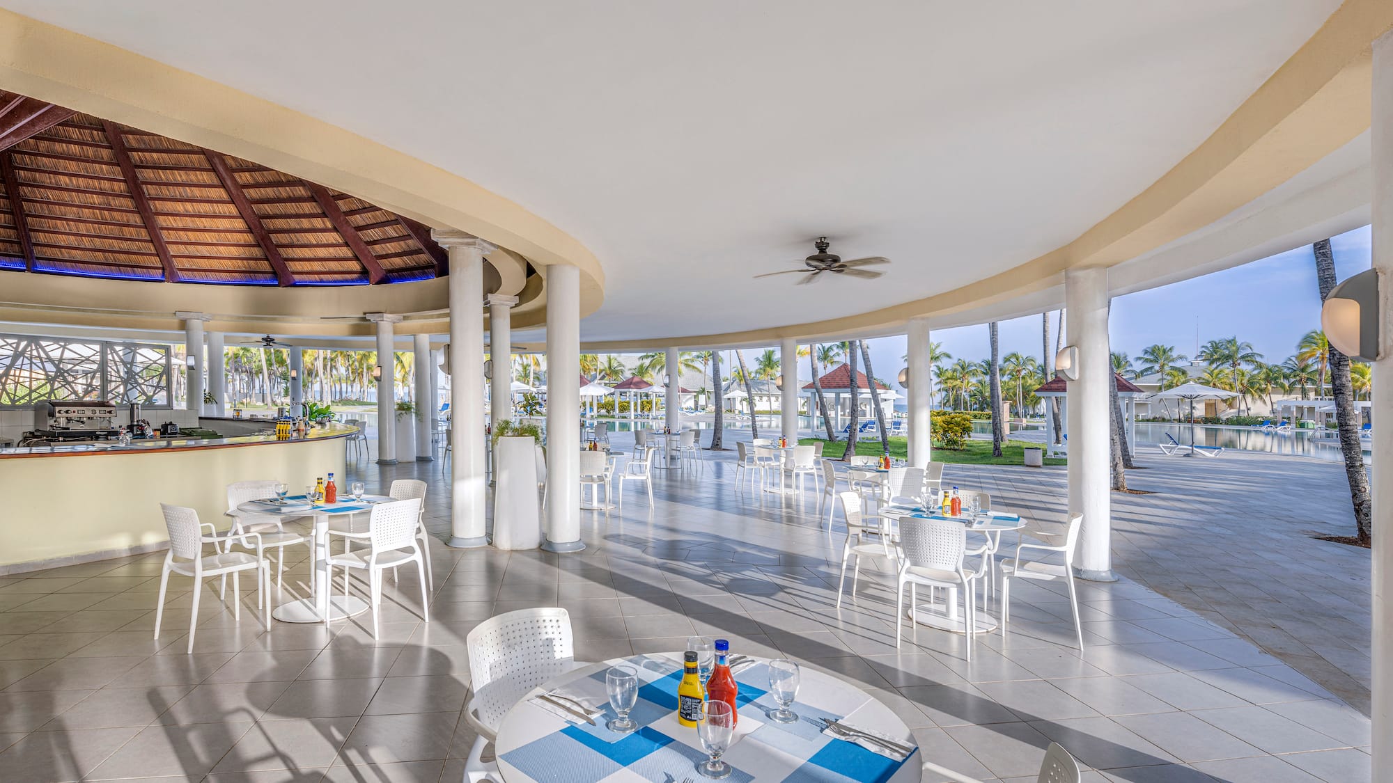 a large room with tables and chairs