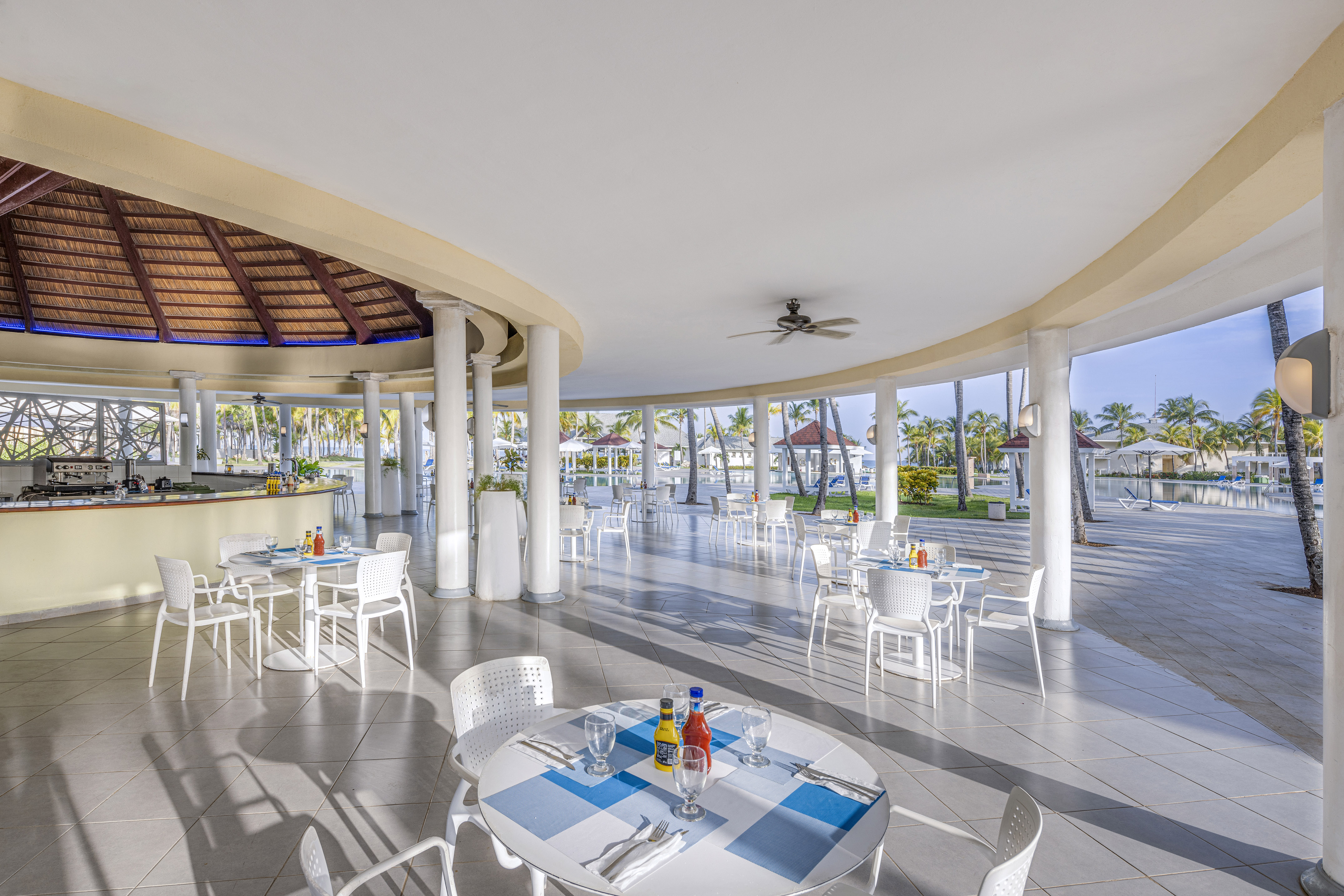a large room with tables and chairs