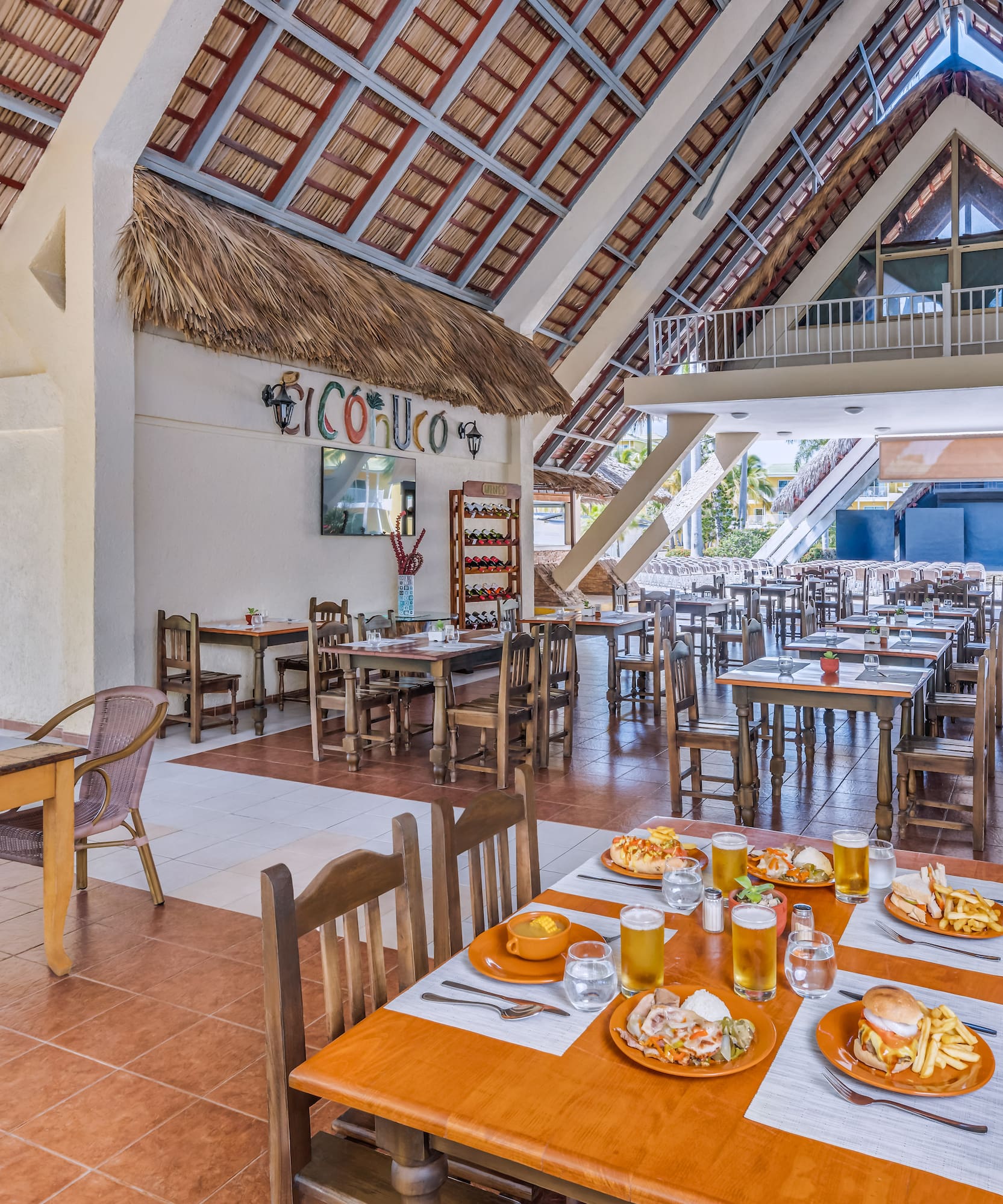 a restaurant with tables and chairs