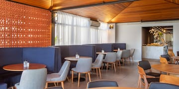 a room with tables and chairs