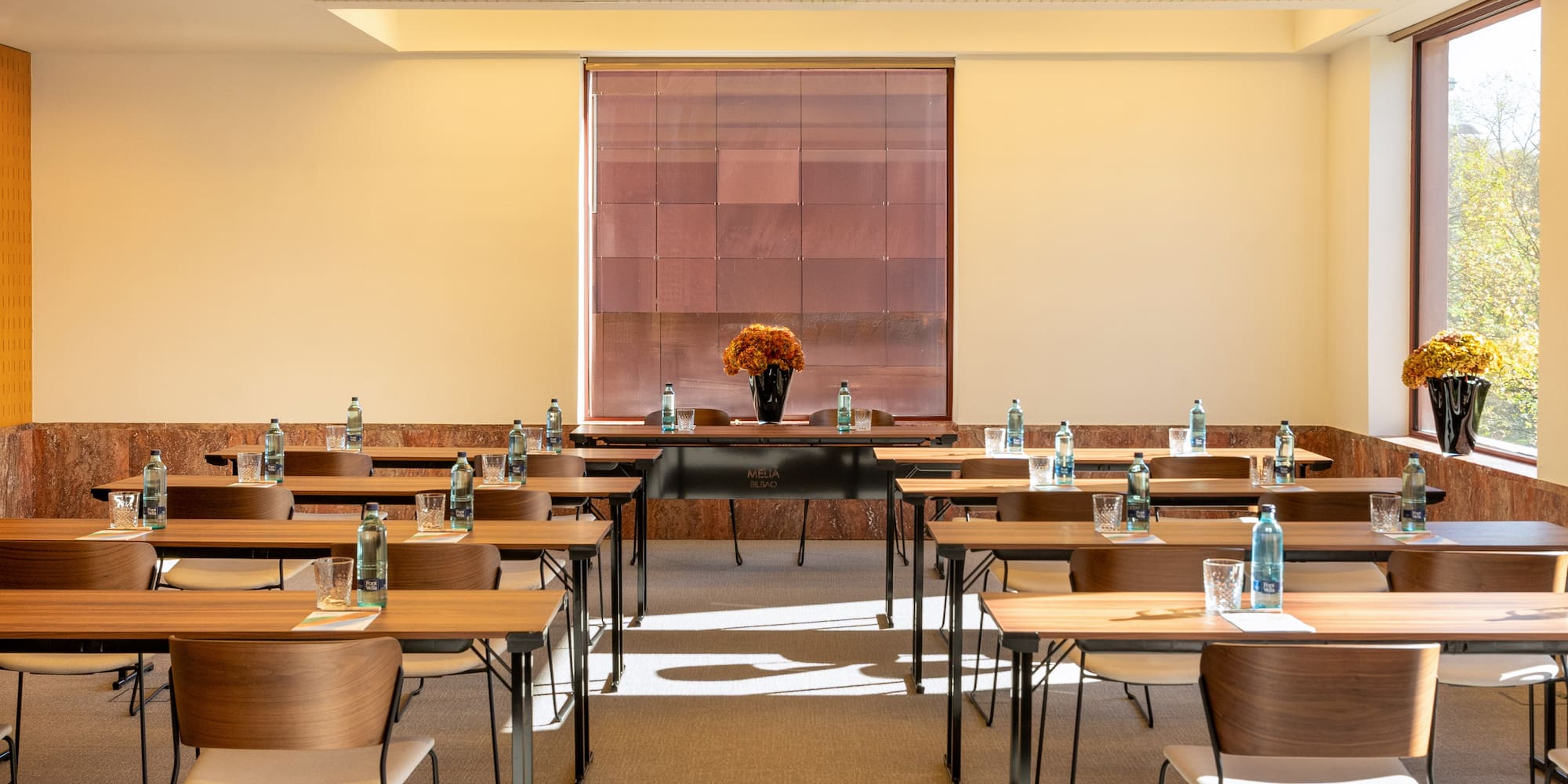 a room with tables and chairs