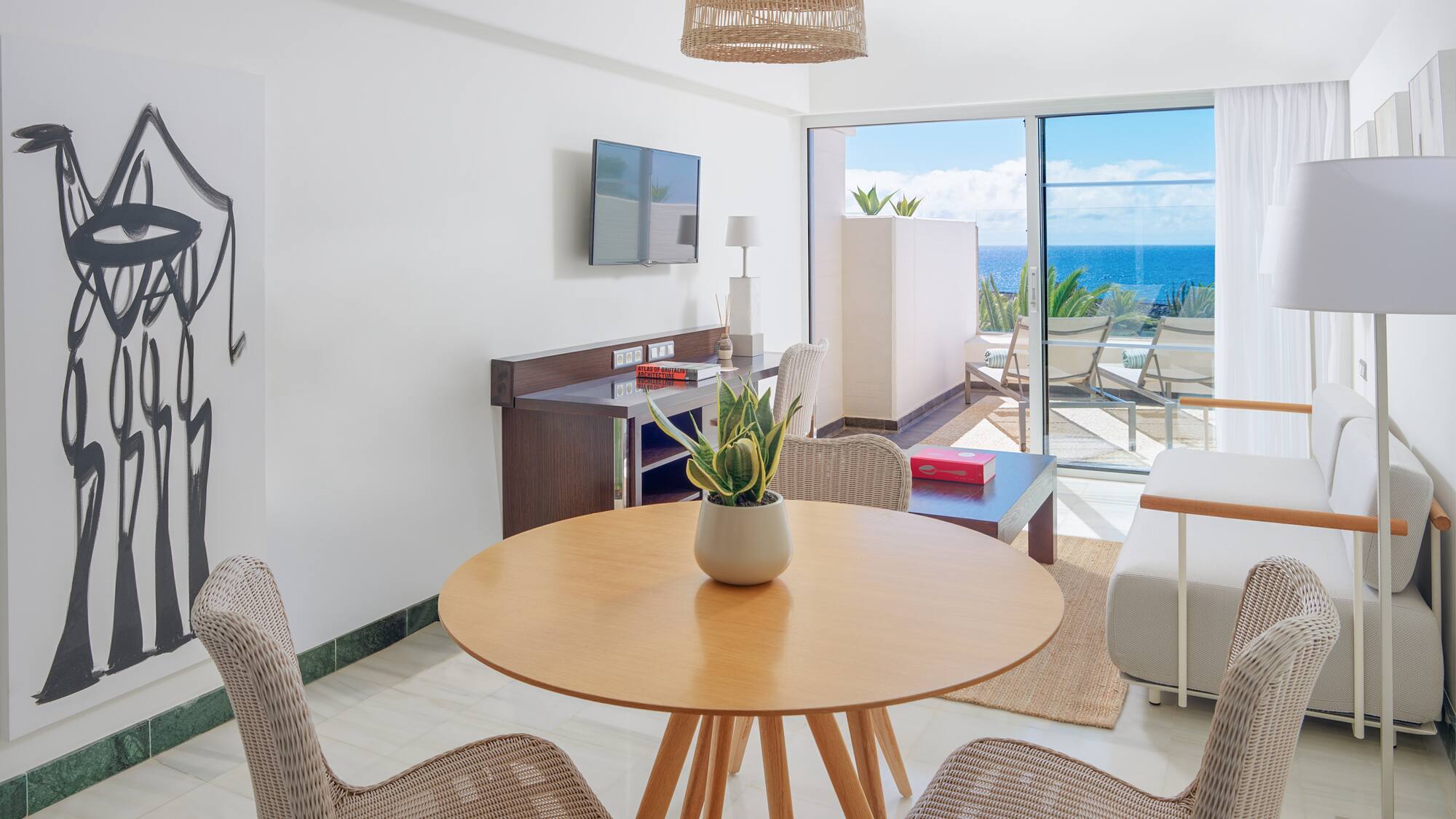 a room with a table and chairs