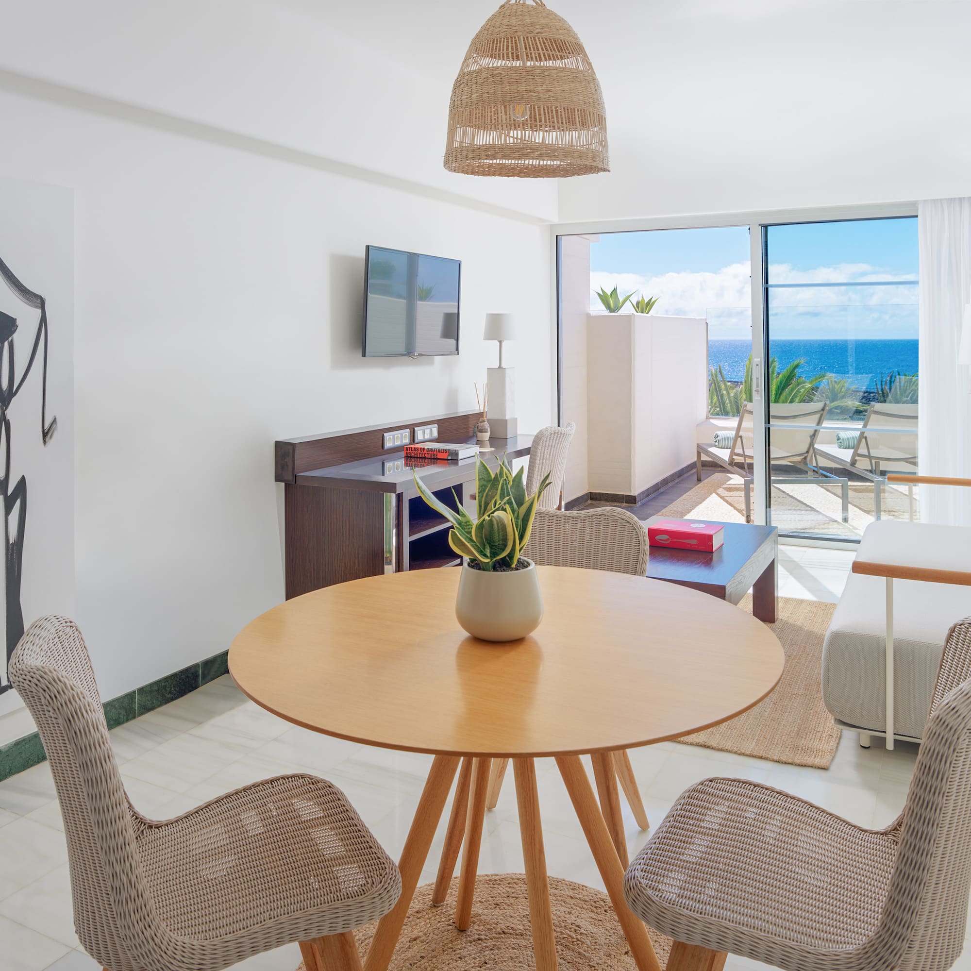 a room with a table and chairs