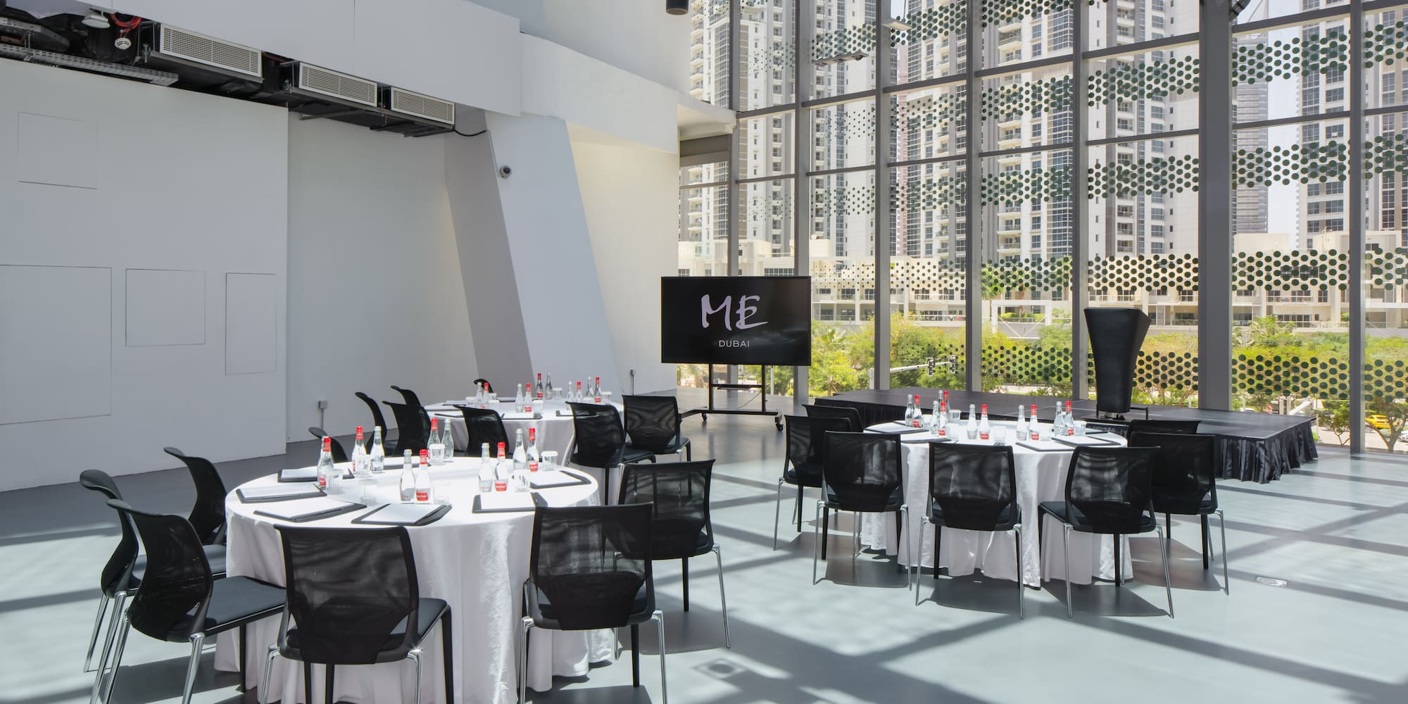 a room with tables and chairs