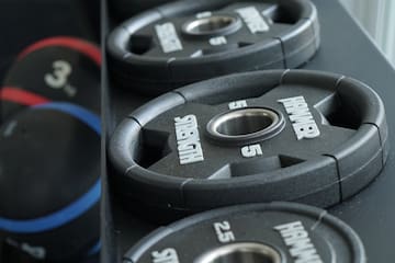 a row of weights on a shelf