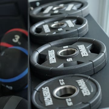 a row of weights on a shelf
