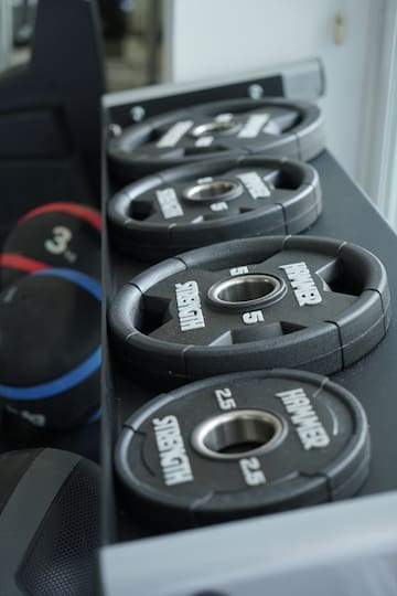 a row of weights on a shelf