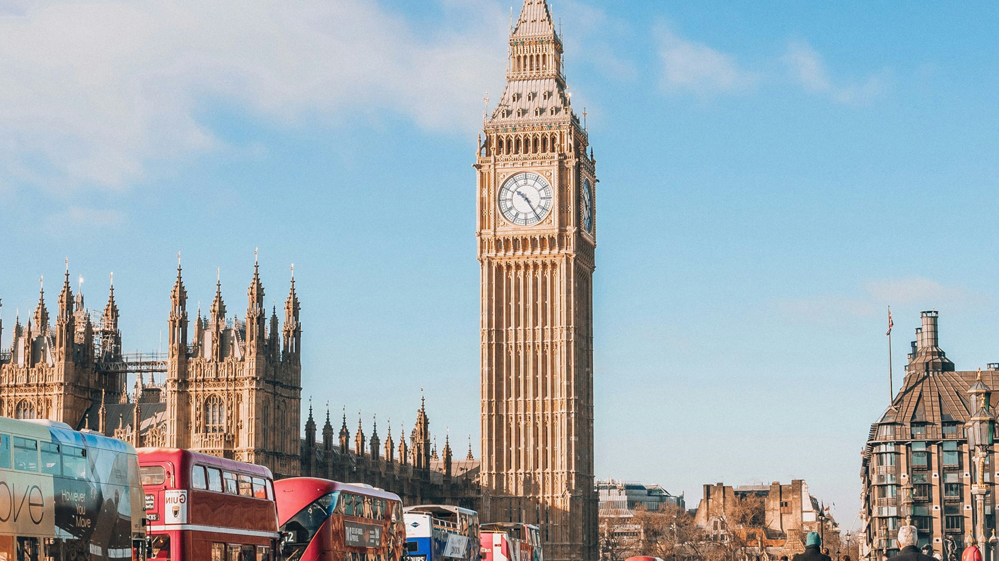a large clock tower in london with Big Ben in the background